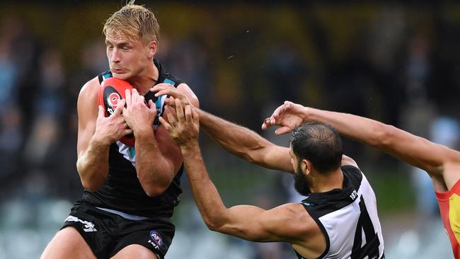 Billy Frampton marks in front of Paddy Ryder during Port Adelaide’s clash with Gold Coast in 2019. Picture: Mark Brake/Getty.