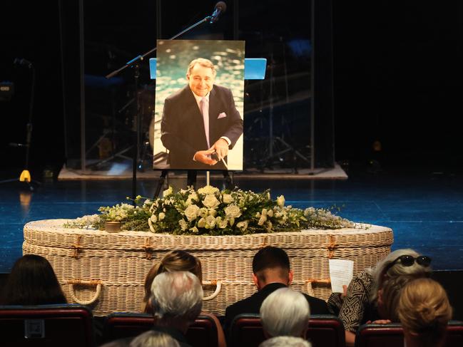 Ian Cousins funeral at The Gathering Church Tweed Heads. Mourners console Widow Brenda Cousins.  Picture Glenn Hampson