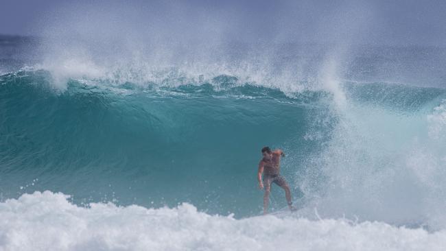 Surfers enjoying the larger swell at Snapper Rocks on Sunday 2 January 2022. Picture: Jerad Williams