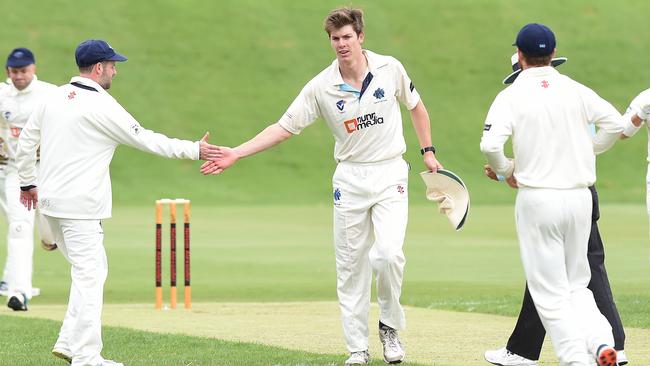 Tom Chalkley is congratulated by teammates. Picture: Josie Hayden