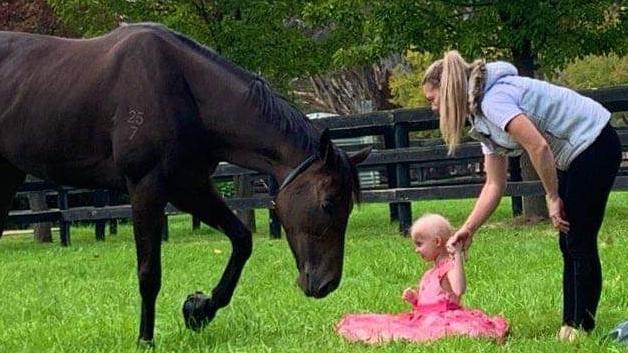 Chelsea Maher, aged seven, is in remission from brain cancer. She loves horses and ponies. She is pictured with her mother Tracey Johnson.