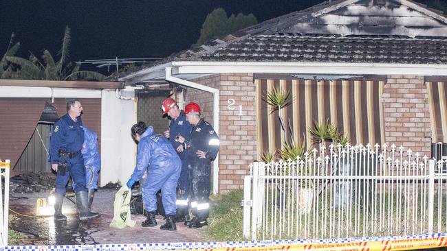 Forensics, police and fire investigators at the scene of the fire in a Bonnyrigg house where a man lost his life on August 25, 2019. Picture: Damian Shaw