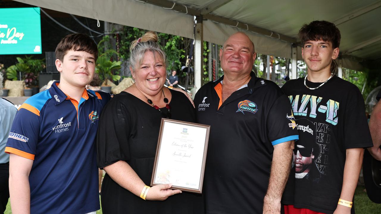 Annette Jarrett was awarded the Cairns Citizen of the Year for volunteering and contributing to various organisations for two decades at the Cairns Regional Council's Australia Day Awards and concert, held at Munro Martin Parklands. Cairns Citizen of the Year Annette Jarrett with her family, son Alex Jarrett, 14, husband Clay Jarrett and son Cameron Jarrett, 14. Picture: Brendan Radke