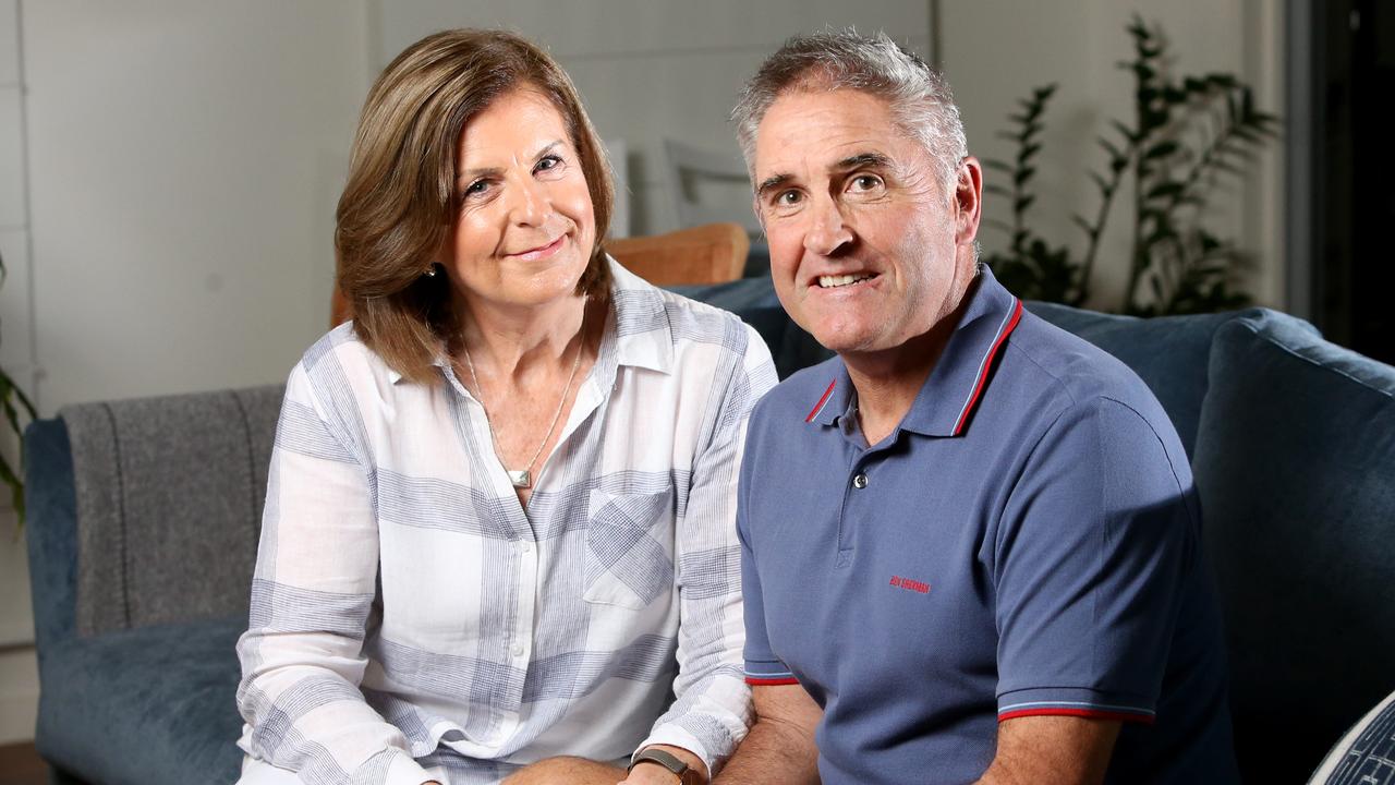 Ursula and Chris Fagan in their Brisbane home during the 2018 footy season.