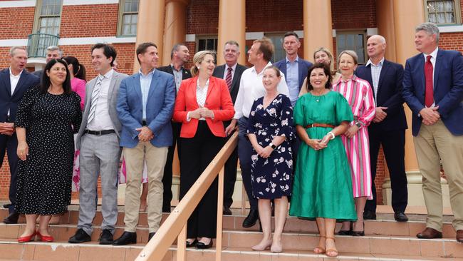 Premier Annastacia Palaszczuk flanked by her ministers. Picture: Lachie Millard