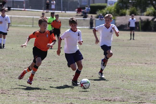 The Premier Invitational football tournament on the Gold Coast. TSS v Brisbane Roar under-13s in action. Picture: Mike Batterham.