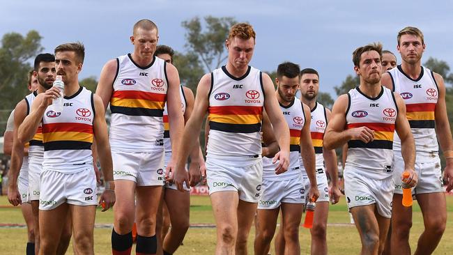 The Crows look dejected after losing their big defeat to Melbourne in Alice Springs. Picture: Quinn Rooney/Getty Images