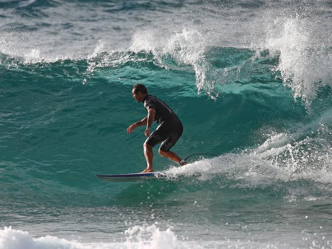 Andrew 'Joey' Johns was among those hitting the water at Bronte. Picture: Toby Zerna