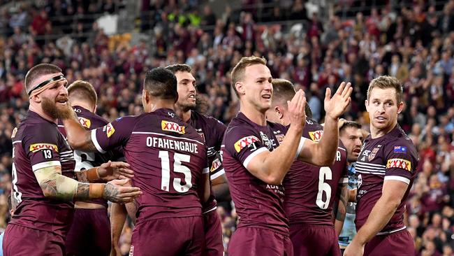 Captain Daly Cherry-Evans celebrates a Queensland try during State of Origin I last year at Suncorp Stadium. Picture: Getty Images