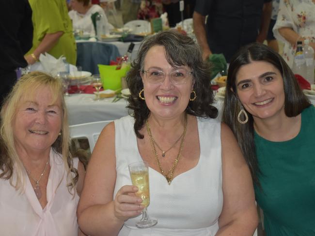 Fiona, Kylie and Bronwyn get into the spirit at the Italian long lunch, February 25, 2024.