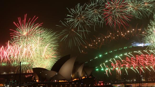 The harbour bridge lights up for the midnight fireworks. Picture: Rohan Kelly