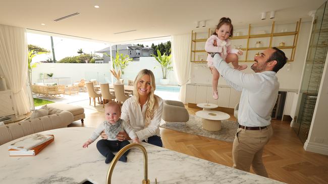 Rebecca and Francisco Smout, with their children Charlie, four months, and Annabelle, two in their freshly renovated Queensland. Picture: Lyndon Mechielsen