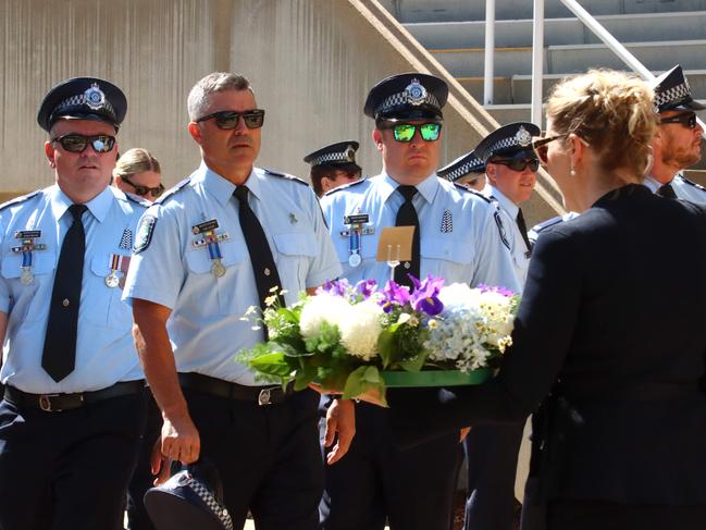 Mourners at the memorial service with full police honours for constables Rachel McCrow and Matthew Arnold at Brisbane Entertainment Centre. Picture: David Clark