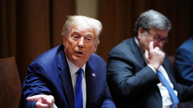 US President Donald Trump, with Attorney General William Barr, right, in September. Picture: AFP