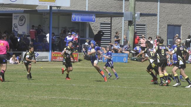 Callum Bowles in motion in the under-13 Group 1 grand final between the Grafton Ghosts and the Clarence Coast Magpies at Frank McGuren Field on Saturday.