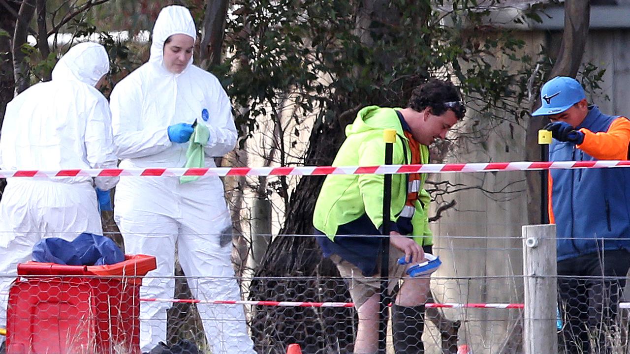 Workers at the Meredith Chicken Farm in Victoria go through a cleaning station before entering the farm. Picture: Mike Dugdale