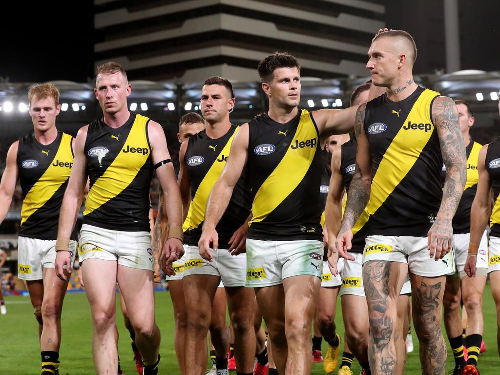 Trent Cotchin leads the Tigers off the Gabba after losing to the Brisbane Lions.