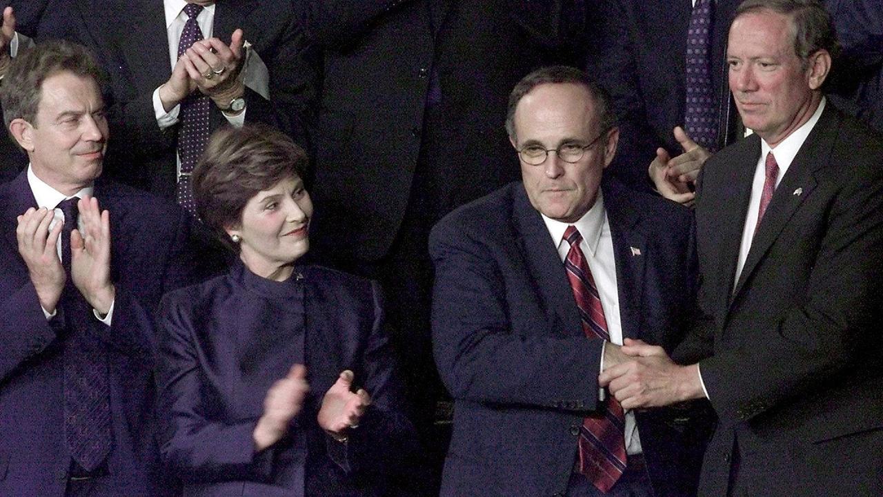 Giuliani, second right, with British Prime Minister Tony Blair, First Lady Laura Bush and NY Governor George Pataki, is honoured at Congress for his post 9/11 work.