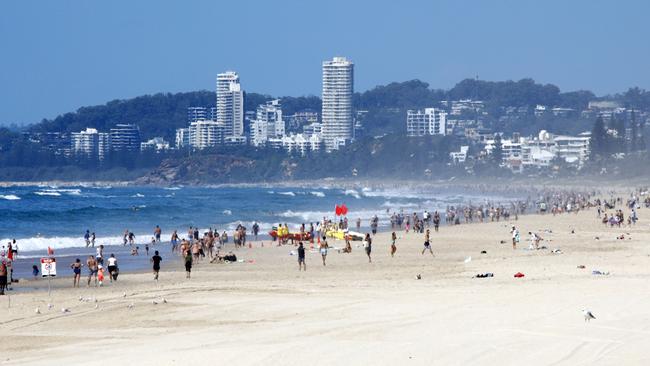 Crowds on Queensland’s Surfers Paradise beach on Easter Monday. Picture: Tertius Pickard