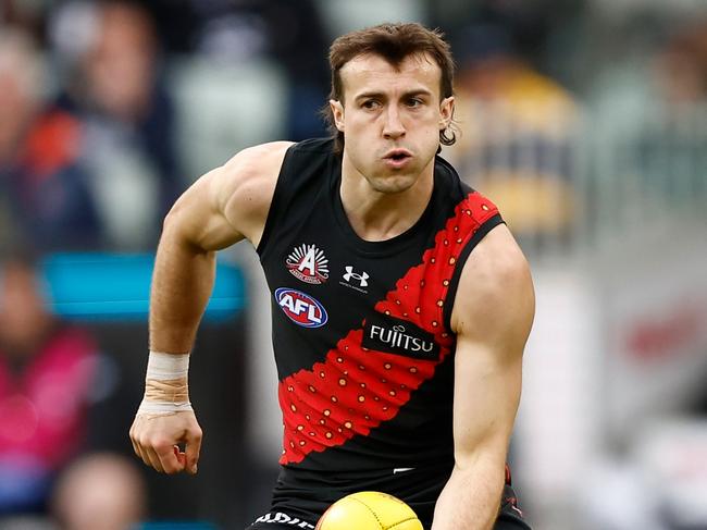 MELBOURNE, AUSTRALIA - APRIL 25: Andrew McGrath of the Bombers in action during the 2024 AFL Round 07 match between the Essendon Bombers and the Collingwood Magpies at the Melbourne Cricket Ground on April 25, 2024 in Melbourne, Australia. (Photo by Michael Willson/AFL Photos via Getty Images)