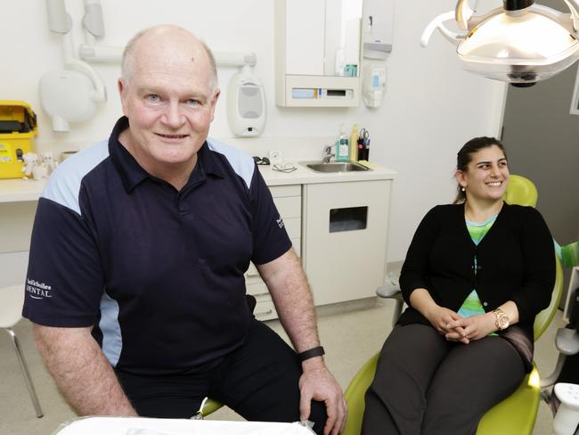 Pacific Smiles co-founder, Alex Abrahams with CEO John Gibbs at their Hunter Street, Sydndy CBD, practice. Pacific Smiles was founded in 2003 by two dentists in the Hunter. It is now a publicly listed company, with 49 centres and annual revenue of $74.9 million. Picture: Justin Lloyd