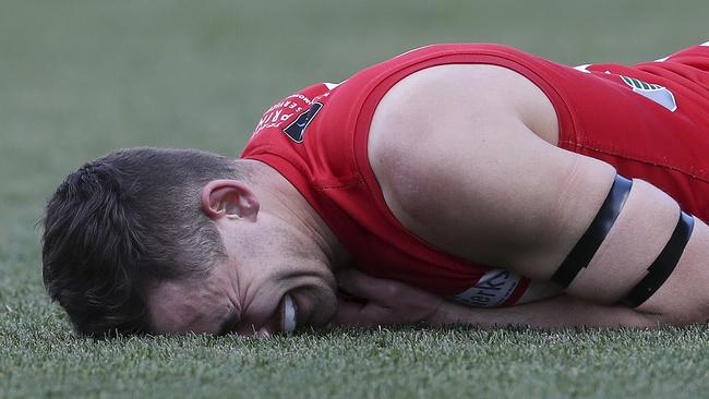 Alex Spina in pain after being crunched by Eagle Matt Goldsworthy. Picture Sarah Reed