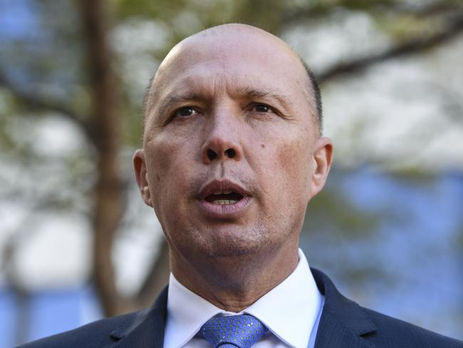 Australian Home Affairs Minister Peter Dutton speaks to the media after the swearing-in ceremony of the new Australian Border Force Commissioner Michal Outram at the headquarter of the Australian Border Force in Canberra, Monday, May 14, 2018. (AAP Image/Lukas Coch) NO ARCHIVING