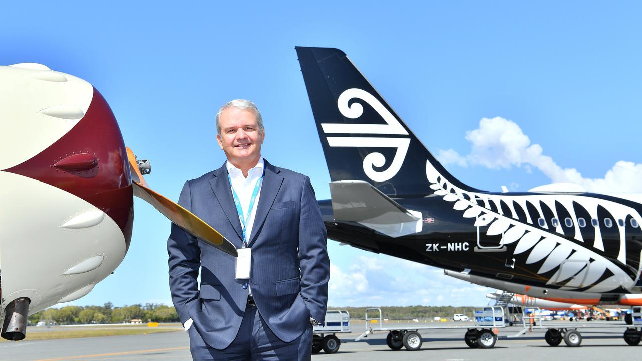 BETWEEN OLD AND NEW: Sunshine Coast Airport CEO Andrew Brodie on the tarmac at Sunshine Coast Airport to celebrate 60 years since the first landing.