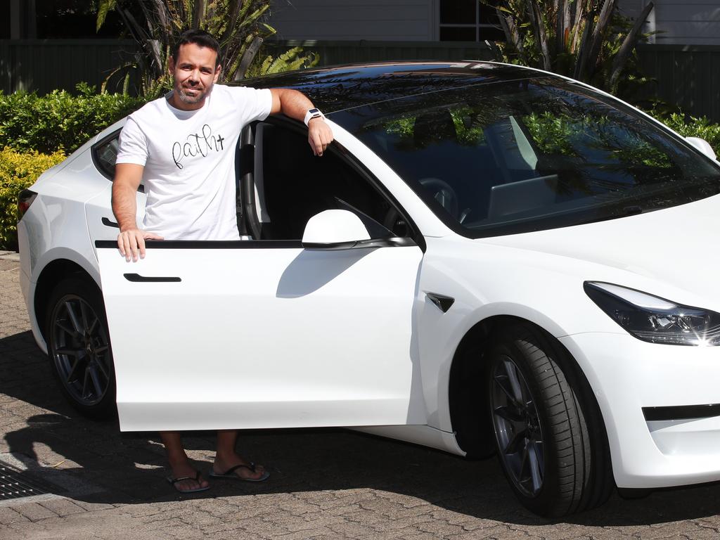 Marcelo Silvestre with a Tesla. Picture Glenn Hampson