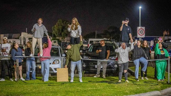 Dedicated Swifties flock to Tullamarine, below left, to catch a glimpse of the singer’s luxury Bombardier Global 6000 private jet. Picture: Jake Nowakowski