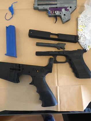 Some of the guns police seized from Sicen Sun’s apartment.