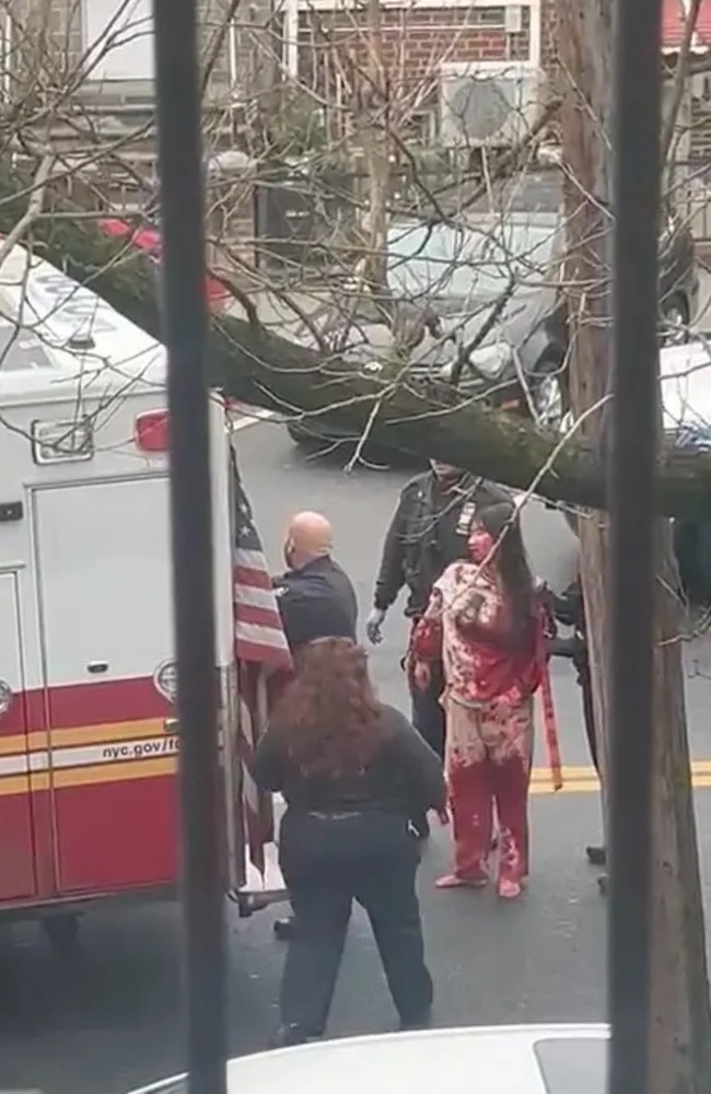 One of the victims can be seen covered in blood. Picture: NY Post.