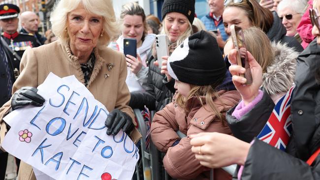 SHREWSBURY, ENGLAND - MARCH 27: Queen Camilla receives a message of support for Catherine, Princess of Wales from well-wishers during her visit to the Farmers' Market on March 27, 2024 in Shrewsbury, England. (Photo by Chris Jackson - Pool/Getty Images)