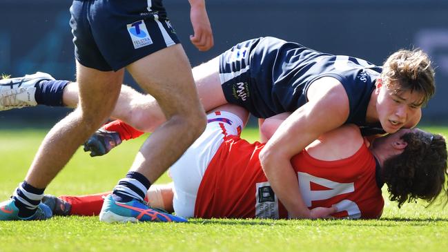 POWERFUL: Tom Sparrow tackles Norwood’s Kale Olds during this year’s SANFL under-18s preliminary final. Picture: Mark Brake (AAP).