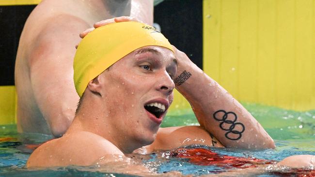 Australia's Zac Stubblety-Cook reacts after setting a new world record. Photo by Brenton Edwards / AFP