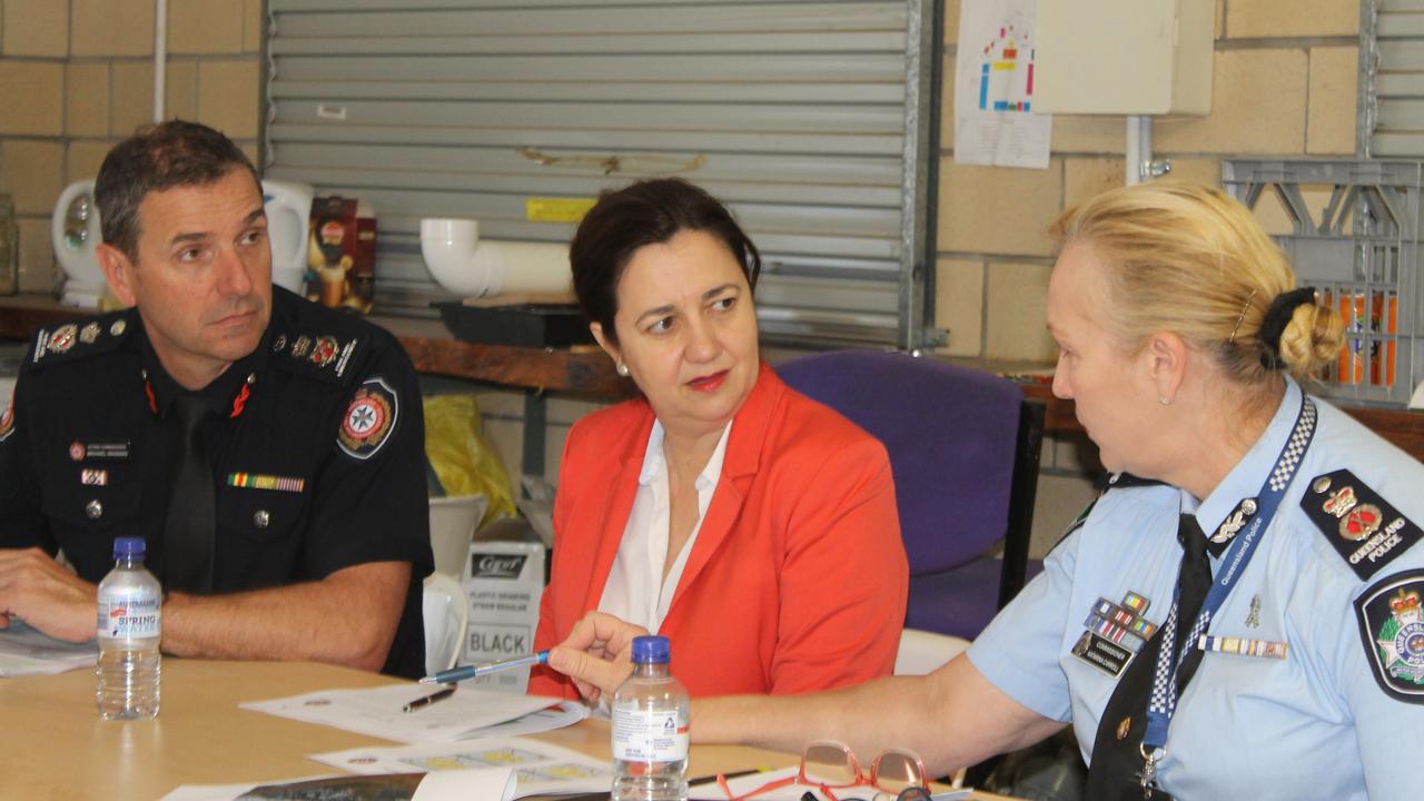 Queensland Fire and Emergency Service (QFES) Acting Commissioner Michael Wassing, Premier Annastacia Palaszczuk and Queensland Police Service Commissioner Katarina Carroll meeting at Canungra Sports and Recreation Ground. Picture: Luke Mortimer