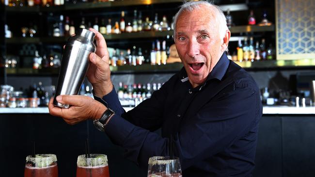 The voice of cycling, Phil Liggett at The Collins Bar at The Hilton with the Tour Down Under cocktail. Photo: Sarah Reed