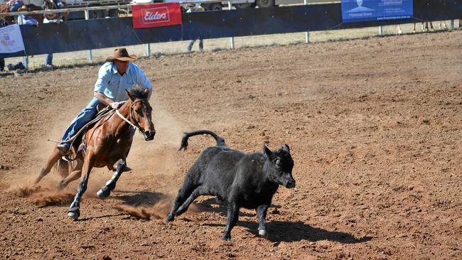 DUST: Jay Pearce and his horse leave a trail of dust during the novice B final. Picture: Molly Hancock