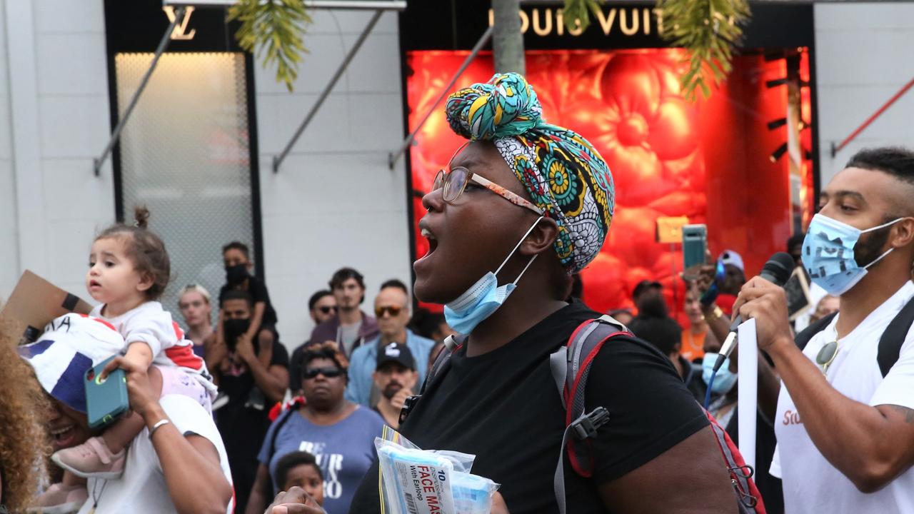 Hitting the streets in Cairns in support of the Black Lives Matter movement. Picture: PETER CARRUTHERS