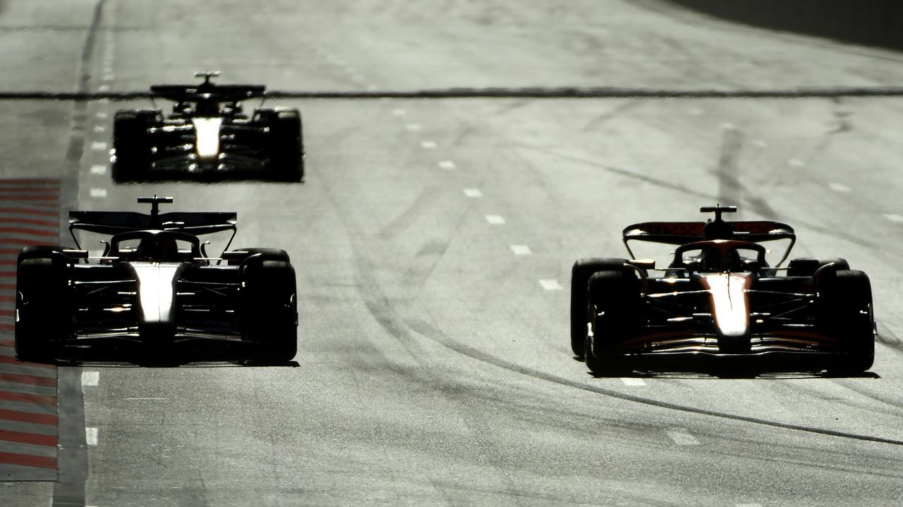 Charles Leclerc of Monaco driving the (16) Ferrari SF-24 and Oscar Piastri of Australia driving the (81) McLaren MCL38 Mercedes battle for track position. Picture: James Sutton/Getty Images