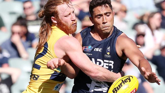 Moonta’s Malcolm Karpany (right) battles Kadina’s Angus Poole during their time in the SANFL. Picture: Sarah Reed