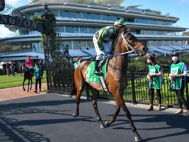 MELBOURNE, AUSTRALIA - OCTOBER 02: Brett Prebble riding Incentivise before winning Race 7, the Tab Turnbull Stakes, during Melbourne Racing at Flemington Racecourse on October 02, 2021 in Melbourne, Australia. (Photo by Vince Caligiuri/Getty Images)