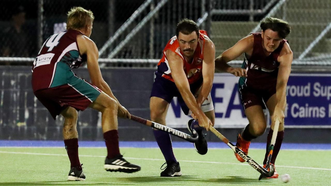 Cairns Hockey A-grade Mens Brothers v Stingers on Rainforest Turf. Brothers' Darwie Sutton, Stingers' Hayden Steele and Brothers' Ashton Winkel. Picture: Stewart McLean