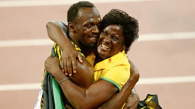 Bolt hugs his mother Jennifer after winning the 100m final at the 2015 IAAF World Championships in Beijing. (Pic: Getty Images)