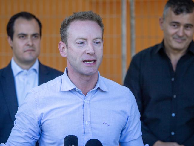 ADELAIDE, AUSTRALIA - Advertiser Photos JANUARY 11, 2023: Leader of the Opposition MP David Speirs and MP Vincent Tarzia with former owner of Safer Places SA on South Road Peter Katarbani at a press conference on South Road. Picture Emma Brasier