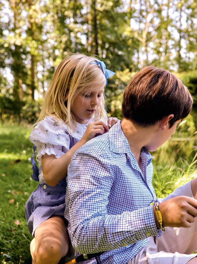 Zoë and Olivier de Givenchy’s children, 11-year-old son Louis and seven-year-old Inès, play by the river. Photography: Darren McDonald.