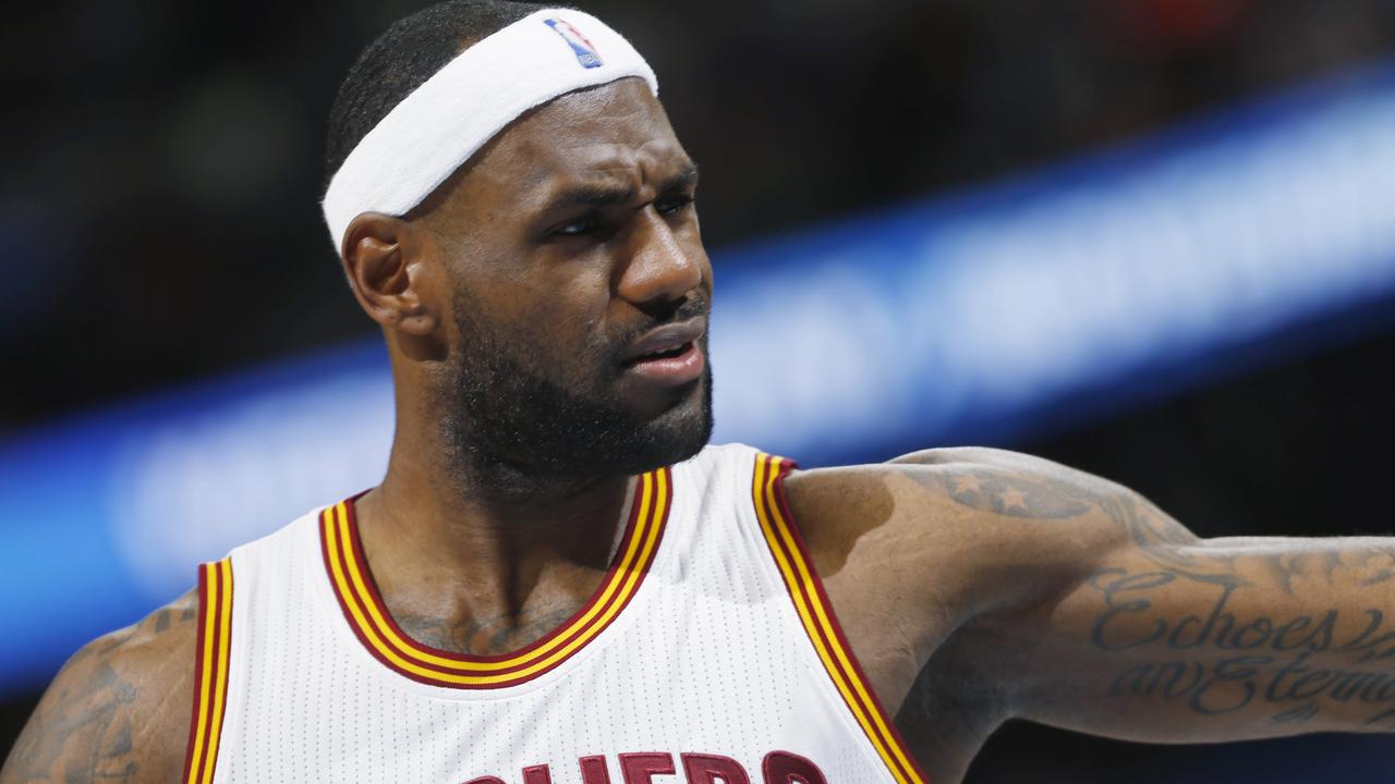 Cleveland Cavaliers forward LeBron James talks to his teammates in the fourth quarter of the Cavaliers' 110-101 victory over the Denver Nuggets in an NBA basketball game in Denver on Friday, Nov. 7, 2014. (AP Photo/David Zalubowski)