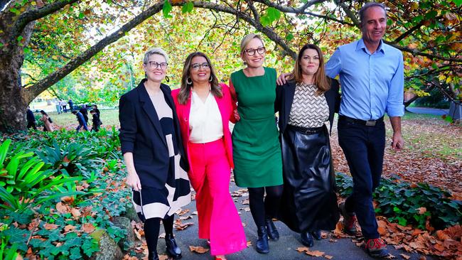 Newly elected Greens leader Larissa Waters is seen with fellow senators ahead of her first press conference in Melbourne.