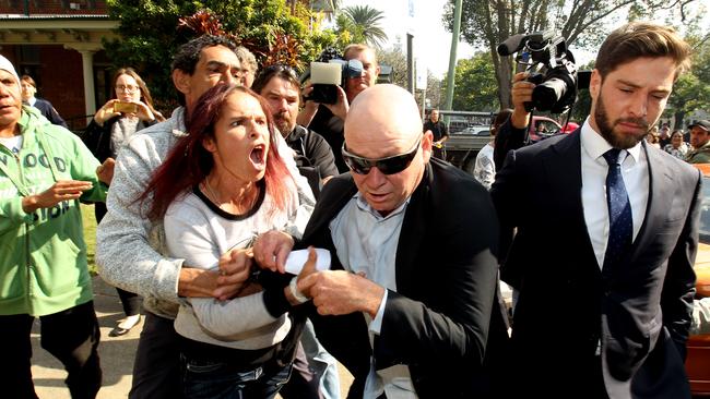 Distraught family members confront Attwater outside Grafton court earlier this year. Picture: Nathan Edwards