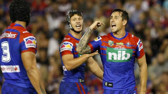 Mitchell Pearce of the Knights shouts instructions.